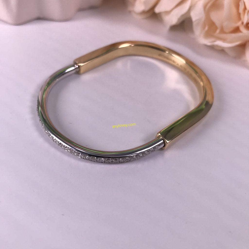 TIFFANY&CO 18CT YELLOW AND WHITE GOLD LOCK BANGLE WITH HALF PAVE DIAMOND