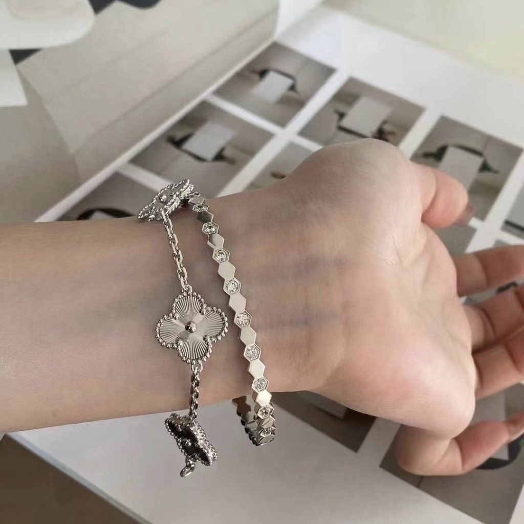 Chaumet bee my love stack with van cleef bracelet and Cartie love bracelet 